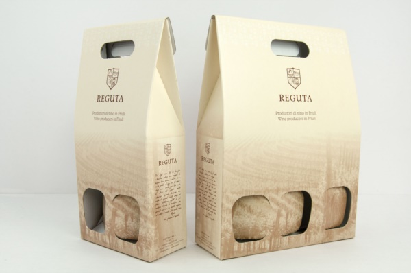 Confezioni per bottiglie con oro in lamina su nero| Packaging - Espositori - Bag in Box 